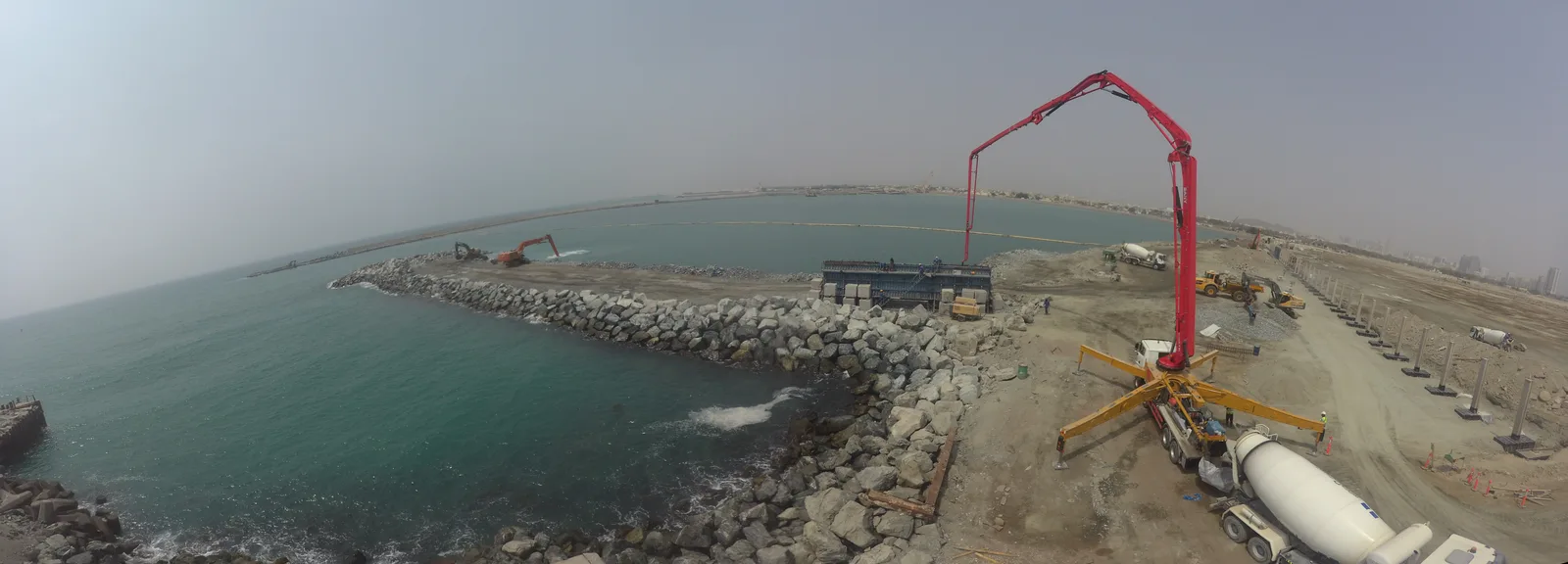 Al Rughaylat Port — concrete placement at the breakwater