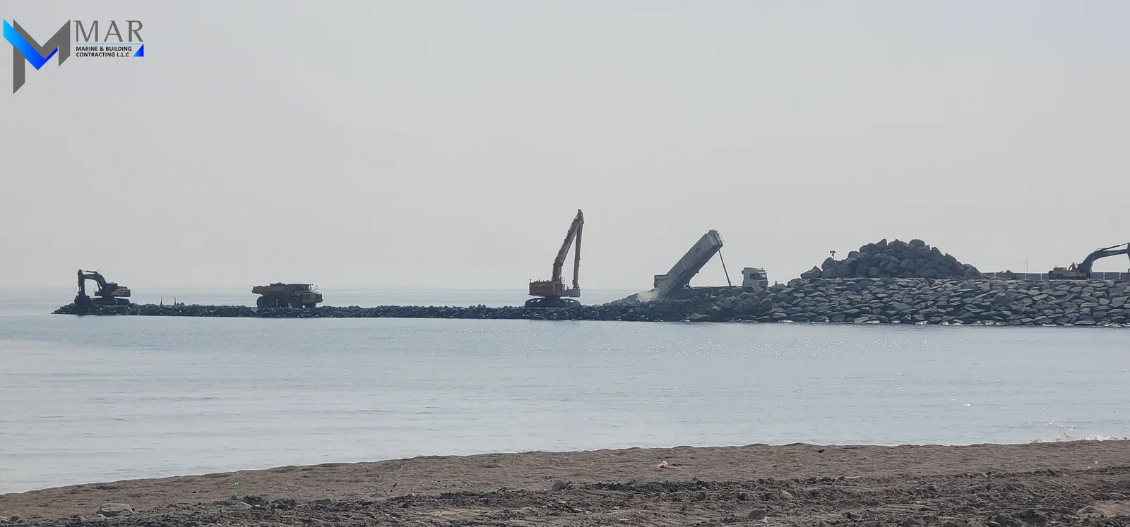 Al Rughaylat Port — an earlier stage of breakwater construction