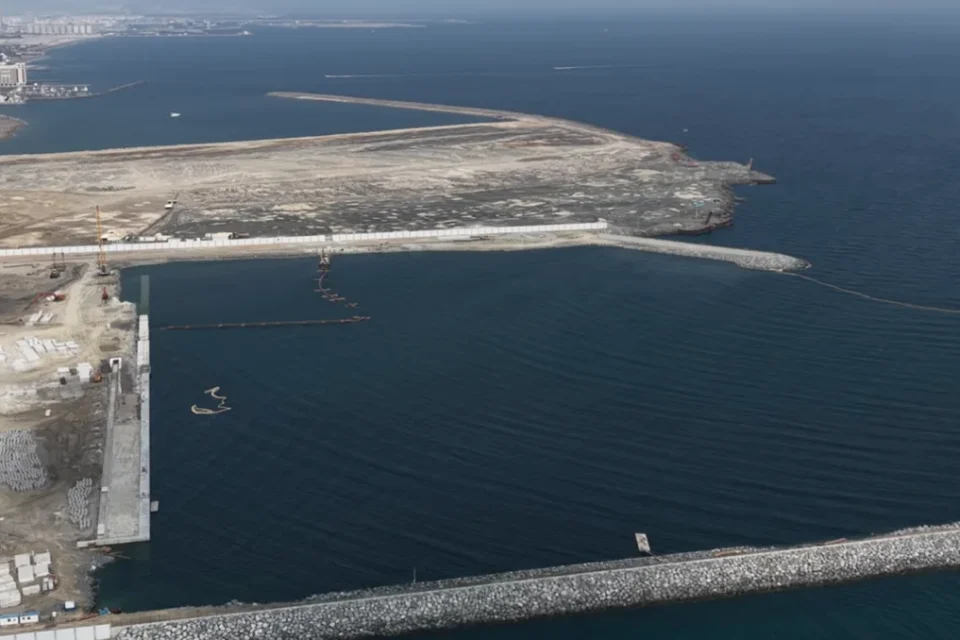 Al Rughaylat Port — aerial overview of the harbour and breakwaters