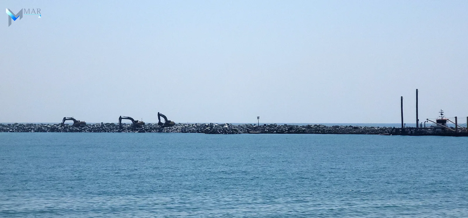 Al Rughaylat Port — rock placement along the breakwater