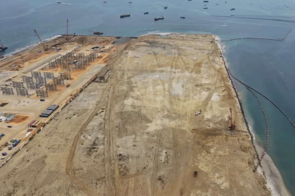 Aerial view of the waterfront and terminal work area at Pointe-Noire
