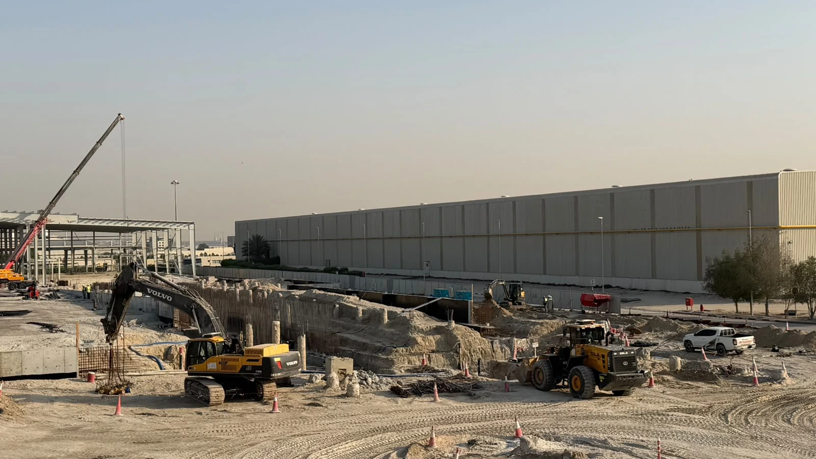 Emirates Float Glass Line 2 — earthworks and excavation beside the existing plant