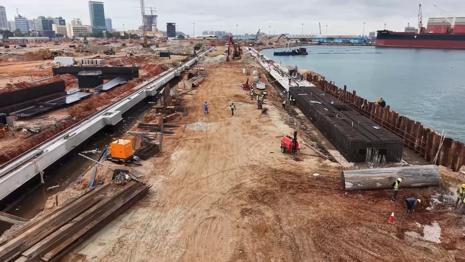 Luanda Marine Works — quay-edge reinforcement and parallel concrete beam works