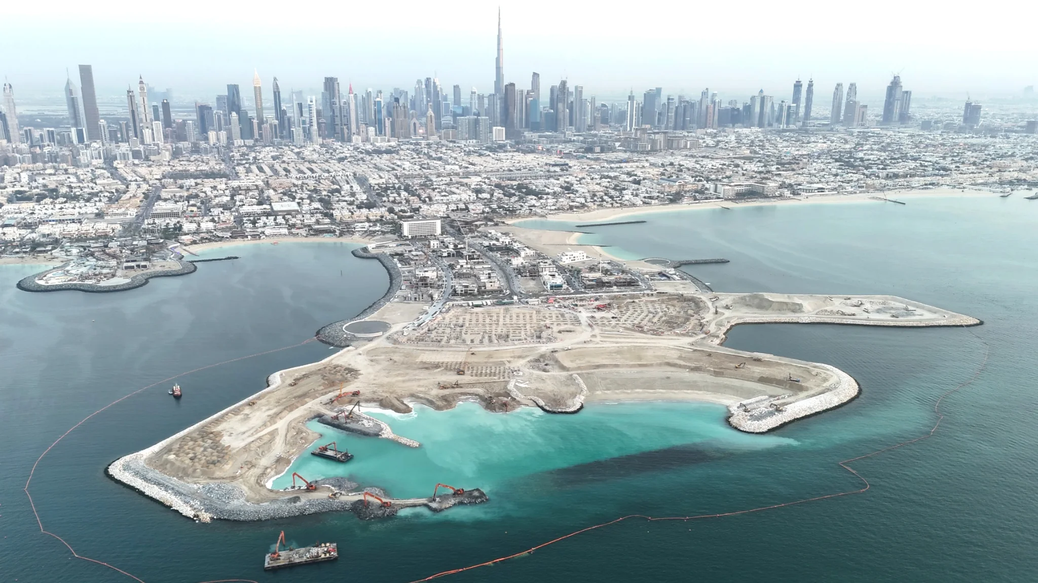 Cape Jumeirah Marine Works MH-0123 — aerial view of the reclaimed peninsula and Dubai skyline