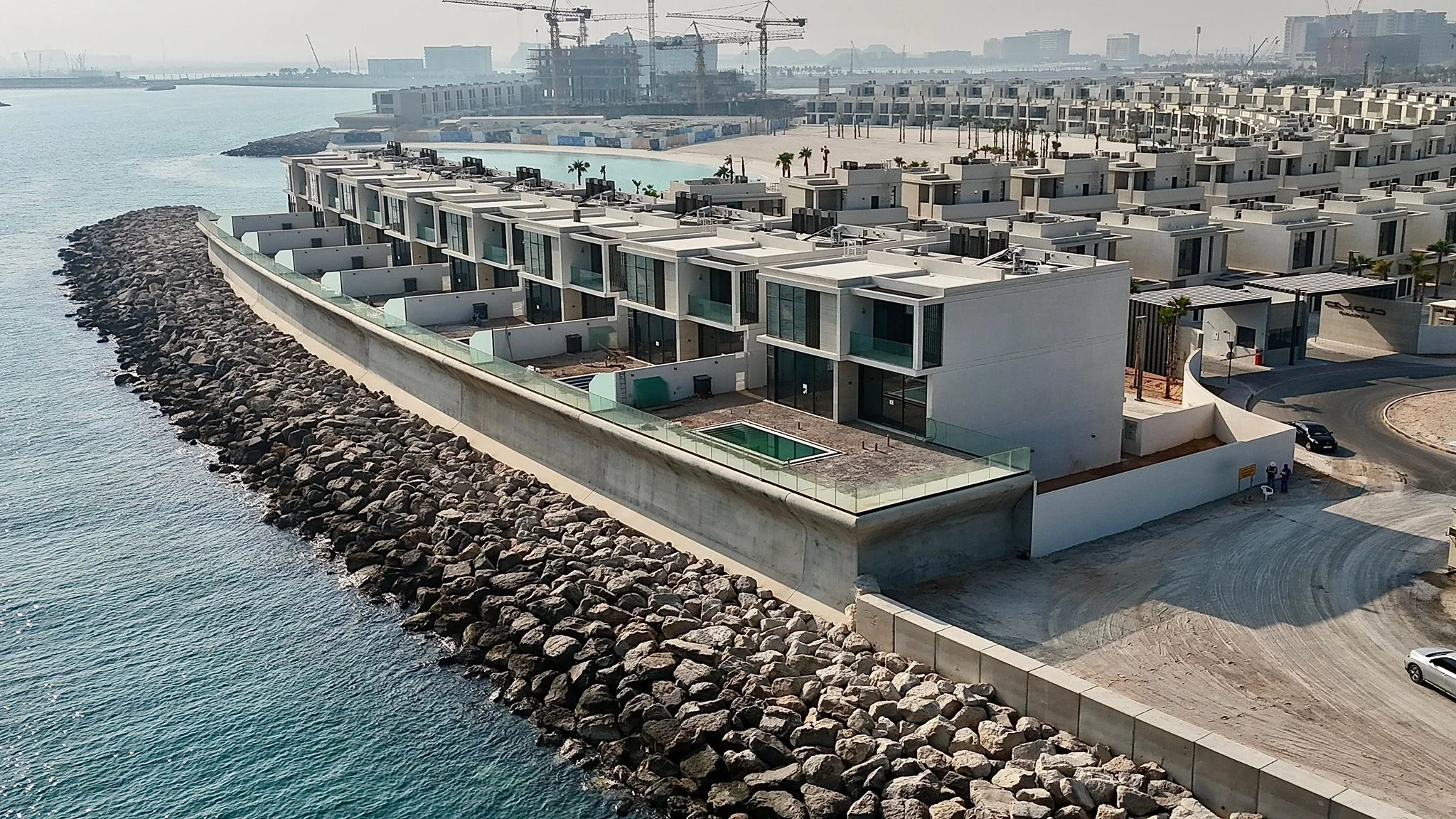 Al Marjan Island — rock revetment and waterfront villa edge